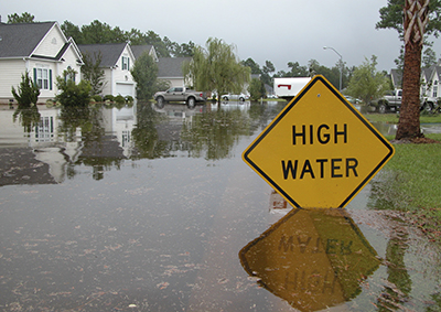 A flooded high water sign