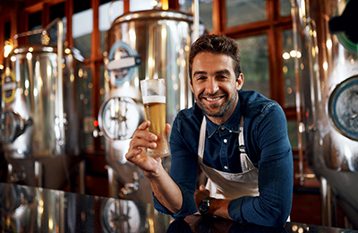 Person holding a beer