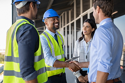 Image of people shaking hands.