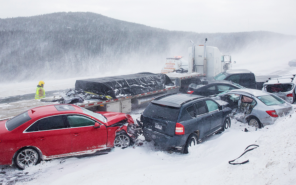 Extreme weather has contributed to the rise in Commercial Auto Insurance rates, due to increased accidents such as this multi-car pileup on a snowy highway.